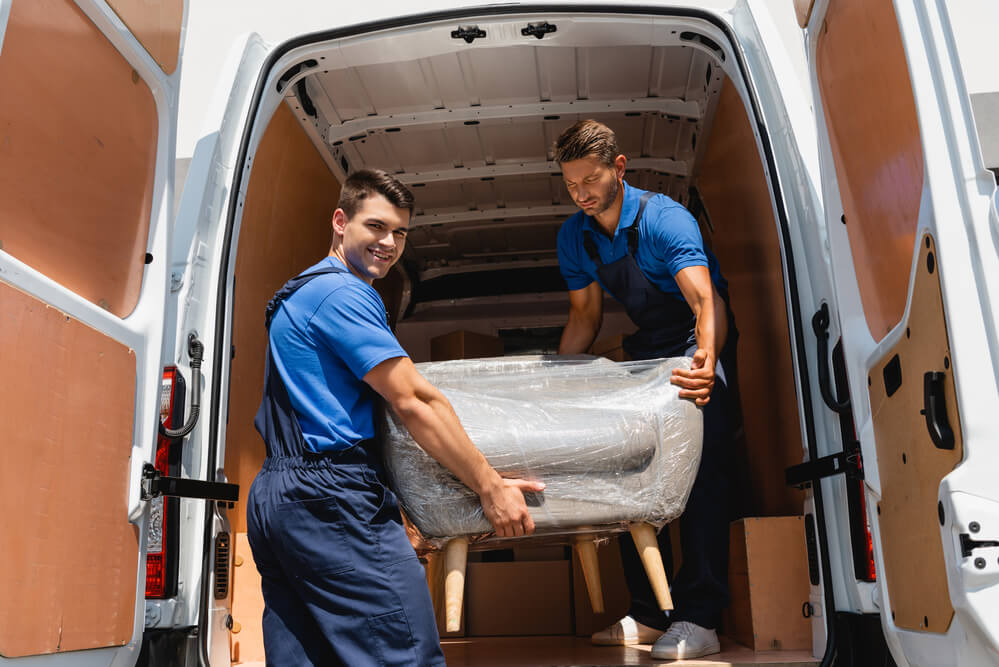 Mover in Nashville loading furniture in van