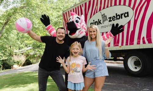 family-with-pink-zebra-moving-truck-wilmington-nc