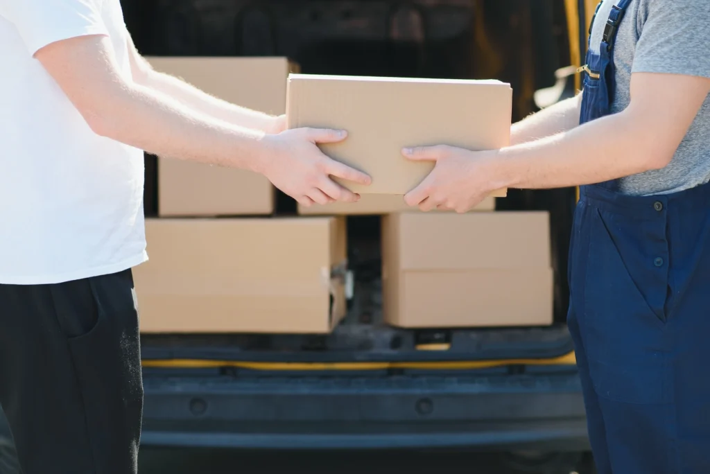 carefully delivering packed items to customers by professional moving companies Florence KY