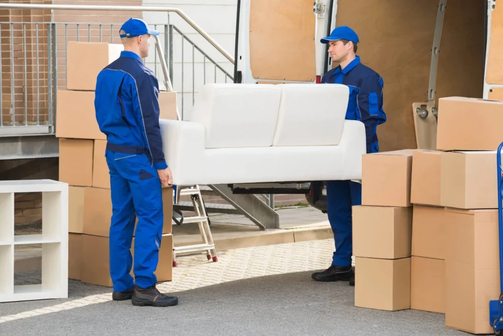 movers Morristown NJ carrying a couch