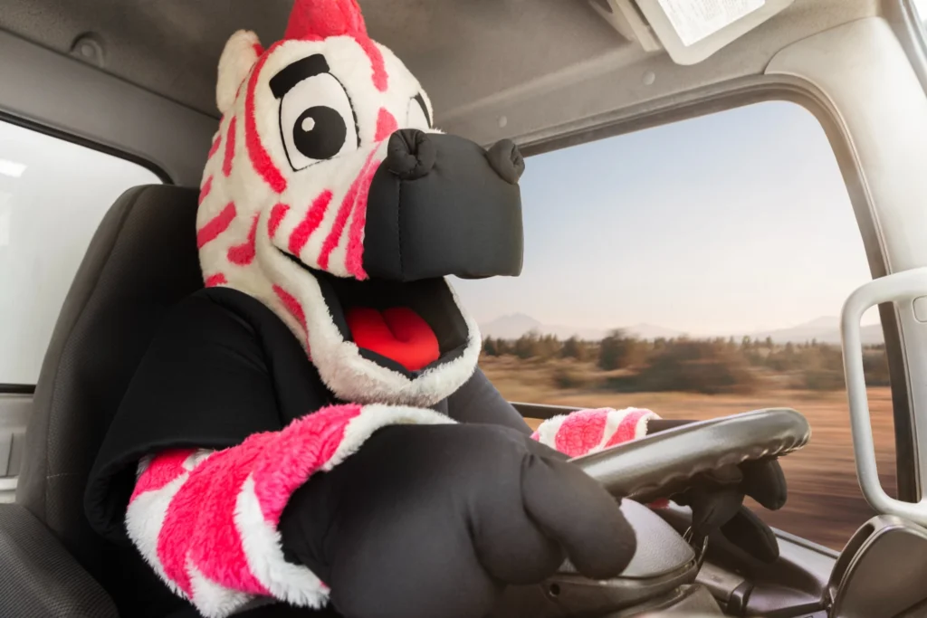movers charlotte nc zebra mascot driving moving truck