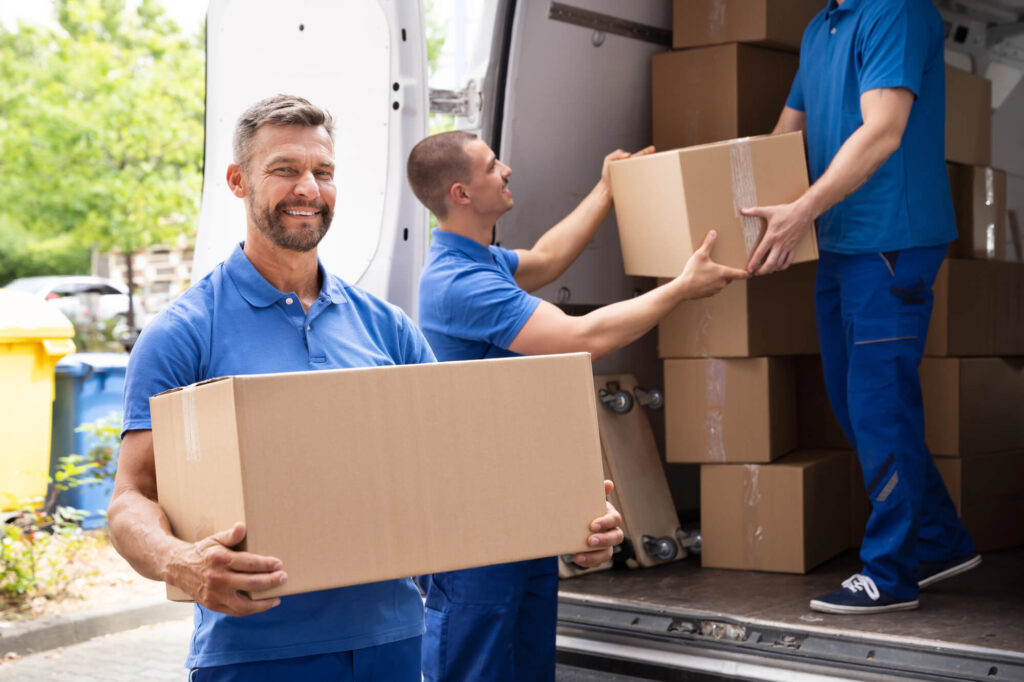 movers in Lawrenceburg, Indiana carrying boxes