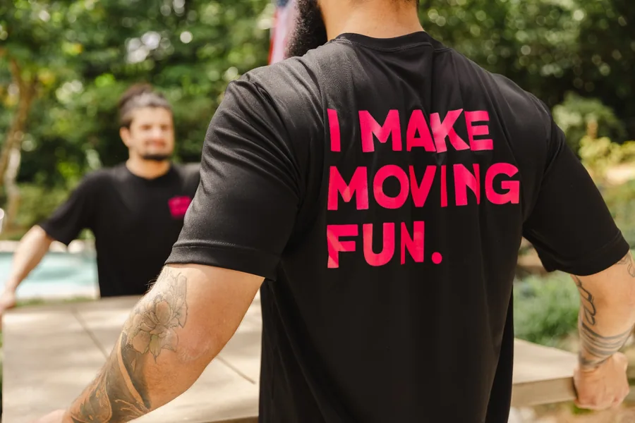 pink zebra moving team members preparing outdoor furniture for a move in montgomery al