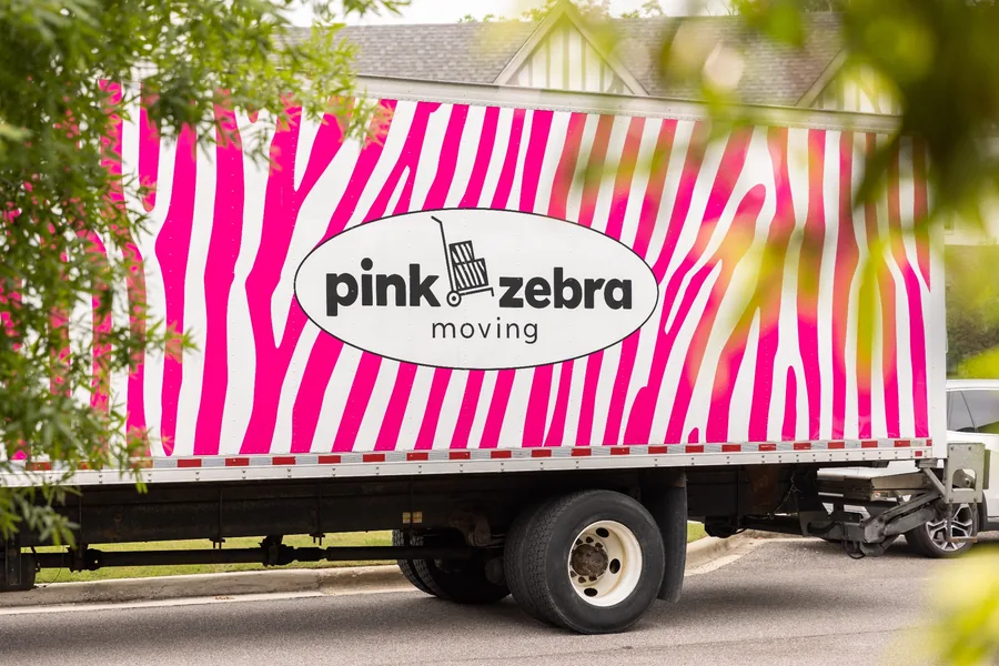 pink zebra moving truck outside home moving companies morristown nj