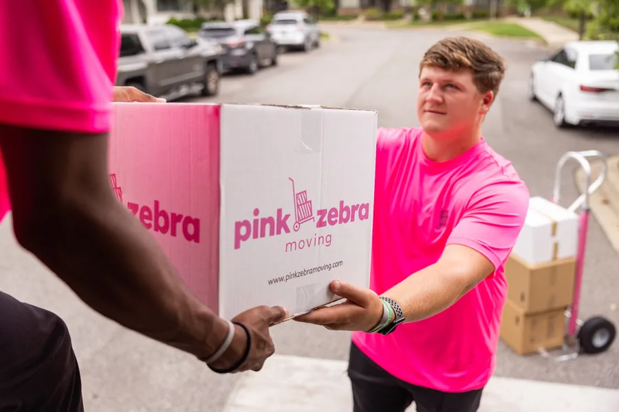 professional movers handing off moving boxes chesterfield mo