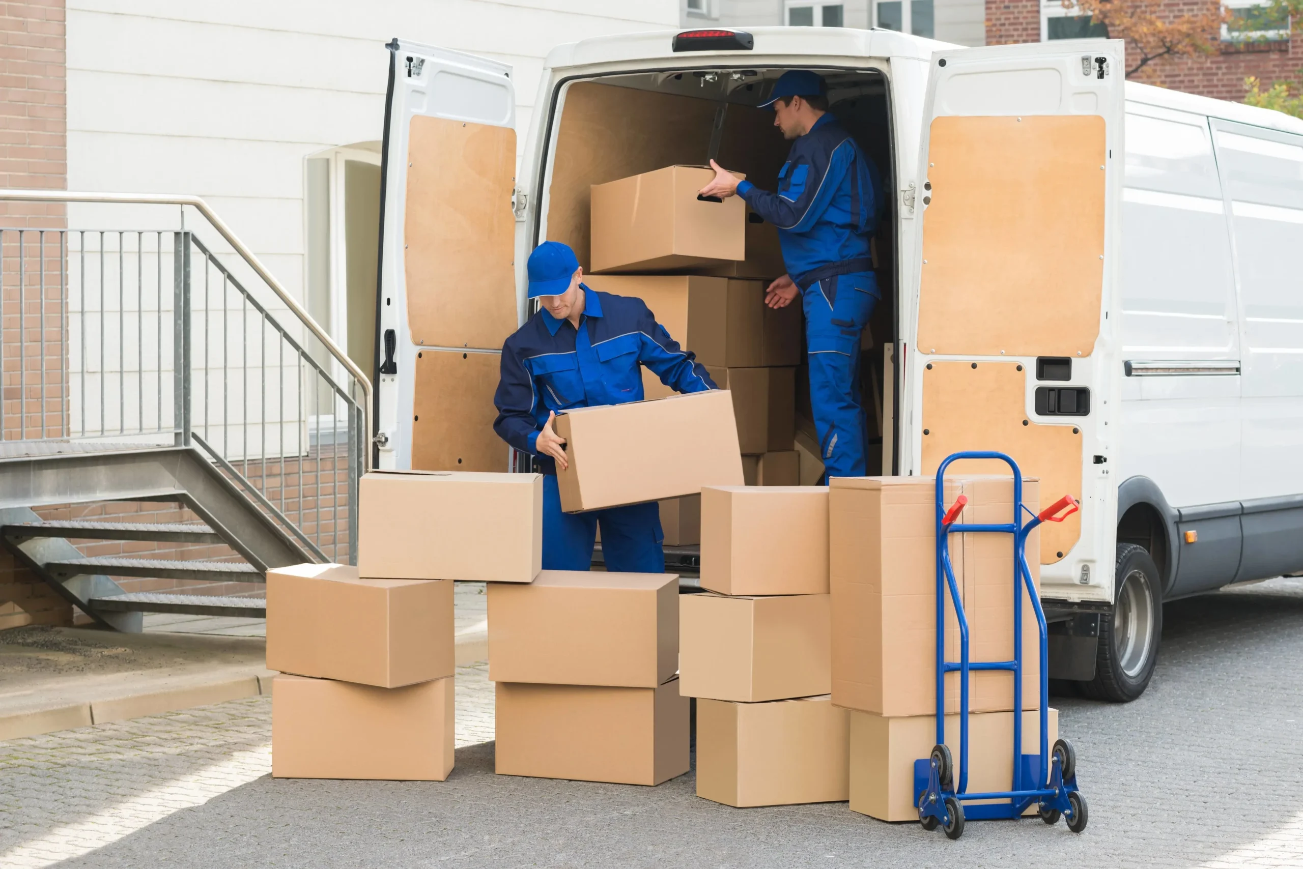unloading boxed home items by expert moving companies farmington Minnesota
